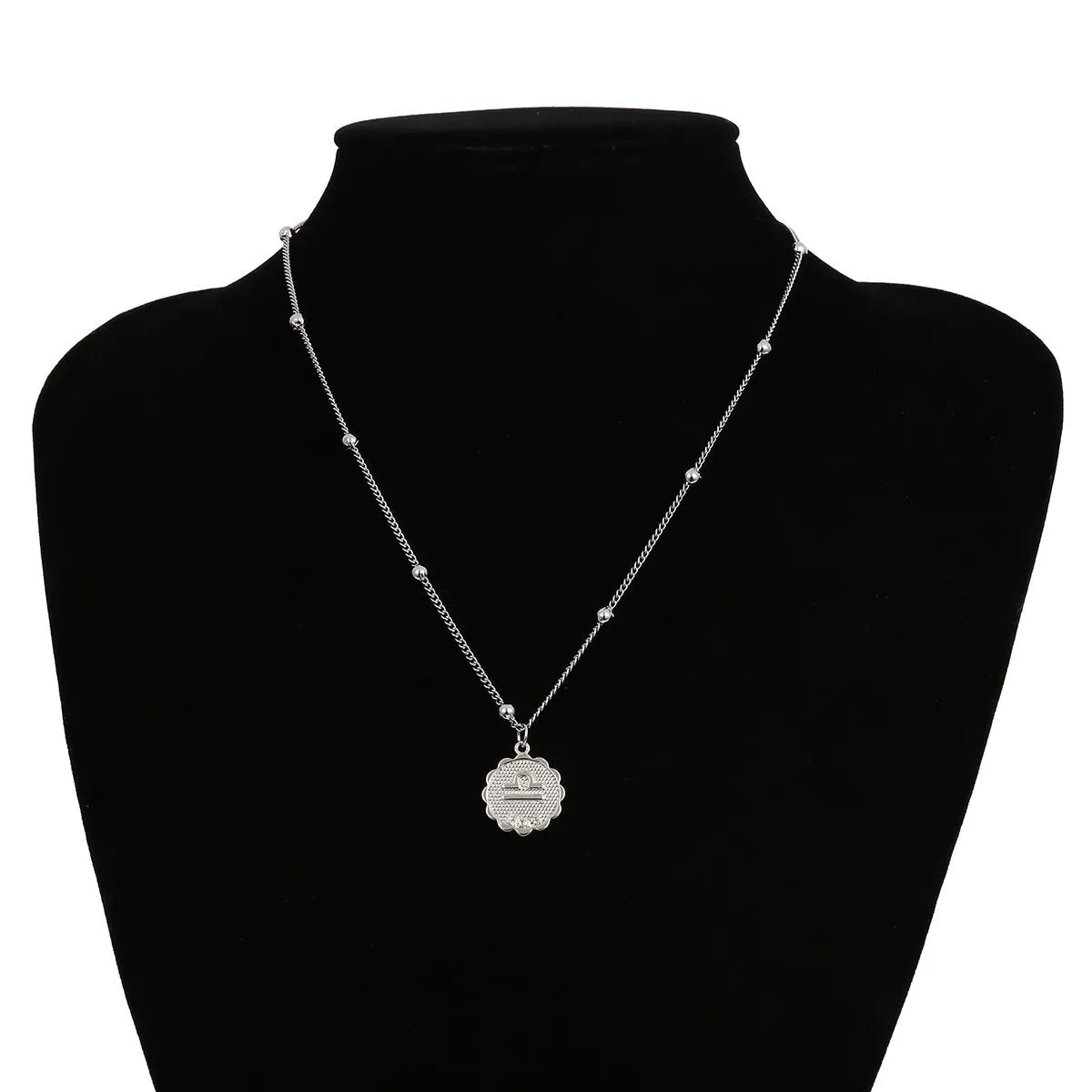 Libra silver zocoin necklace