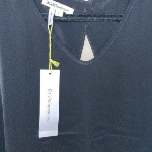 NWT BCBGeneration Black Short Polyester Dress Size 4 With Open Back Detail