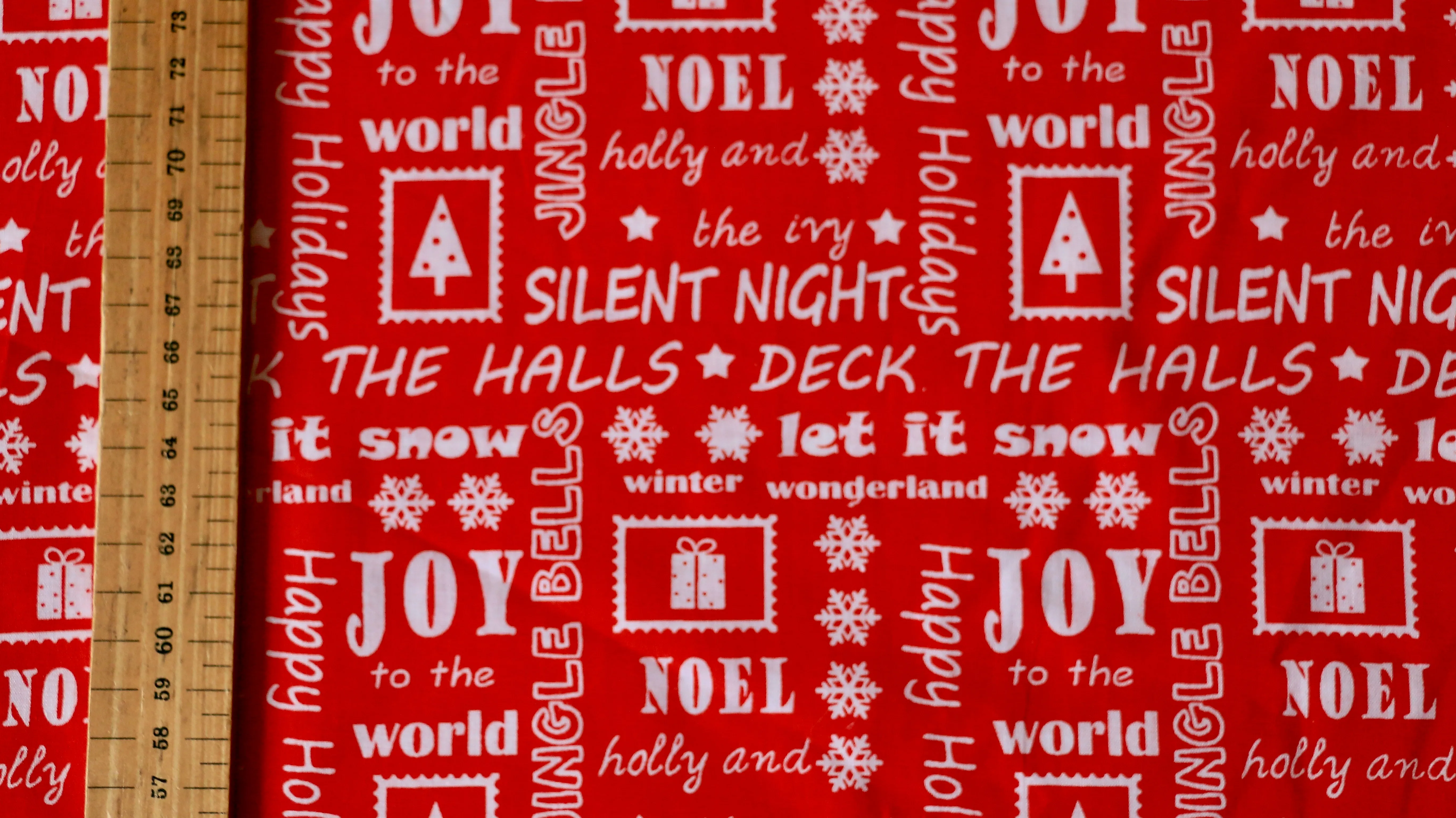 REMNANT 0.60m x 1.12m - CHRISTMAS POLYCOTTON - Christmas song lyric design