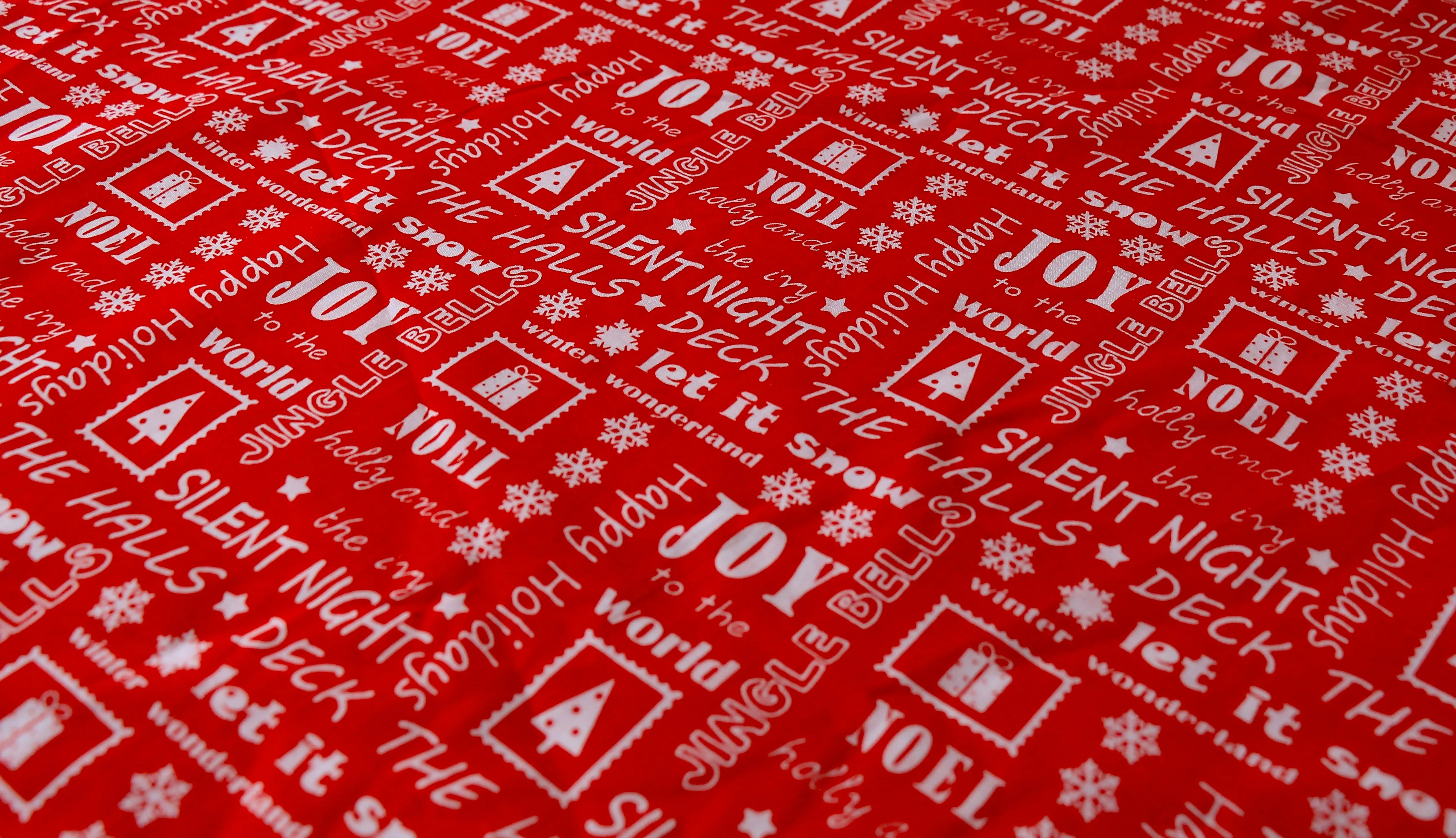 REMNANT 0.60m x 1.12m - CHRISTMAS POLYCOTTON - Christmas song lyric design